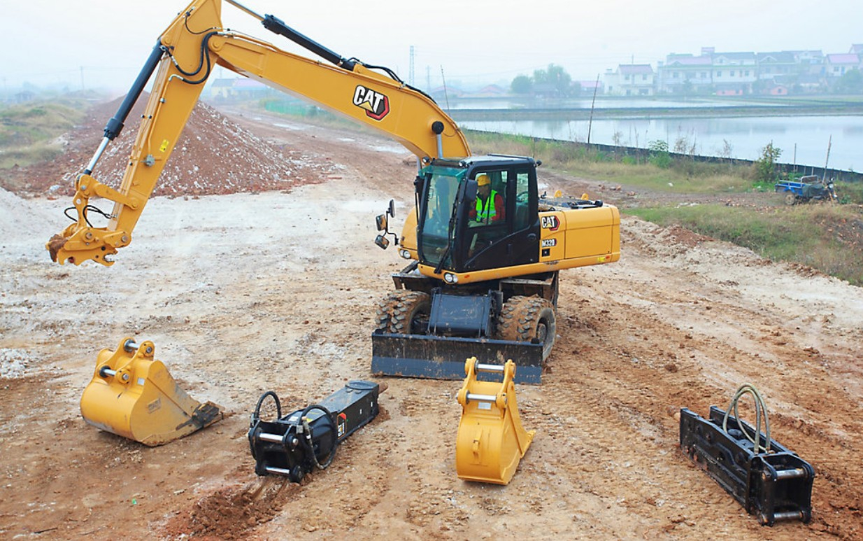 Kolesové rýpadlo CAT M320 2
